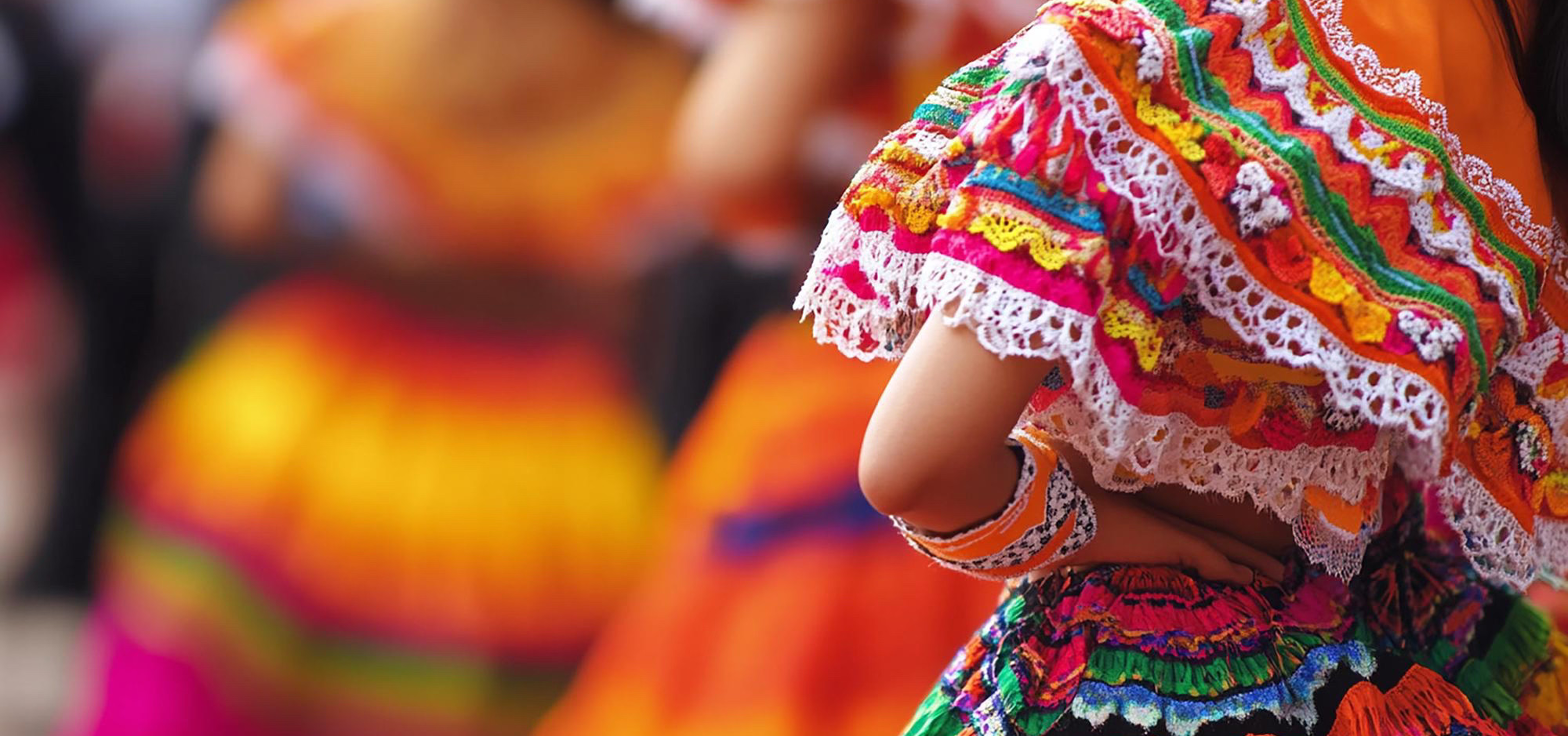 Mexican Folklorico Dancer in colorful traditional dress